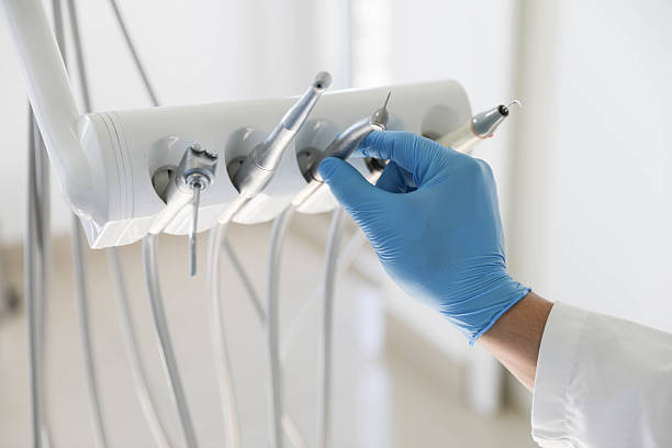 Professional Dental Implants technician working in Oskaloosa, IA